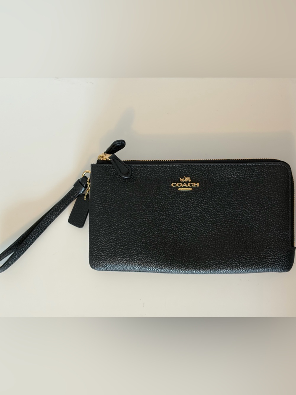 Coach Black Pebbled Leather Zip Wristlet with Gold Logo